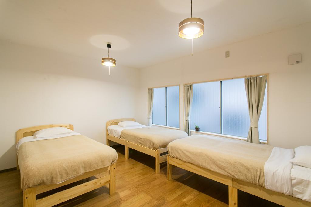 Guest House Yuyu Sapporo Exterior foto